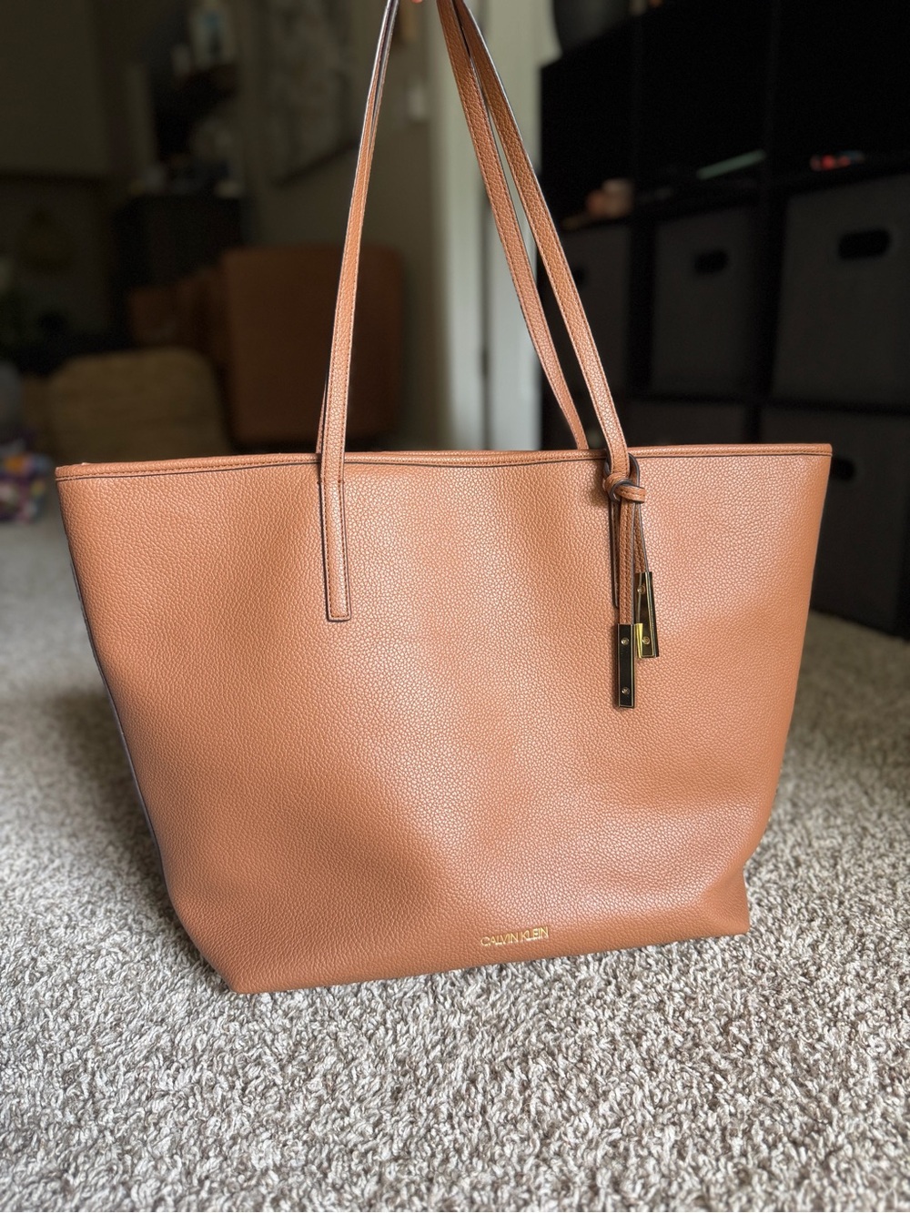 Calvin Klein Cognac Pebbled Leather Tote with Tassel Detail